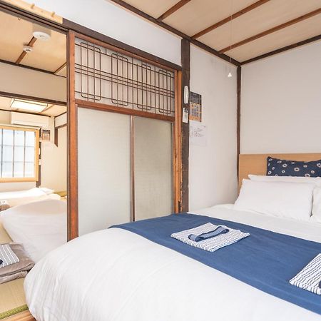 Guesthouse Oneworld Shijo四条京町屋 Kyoto Bagian luar foto