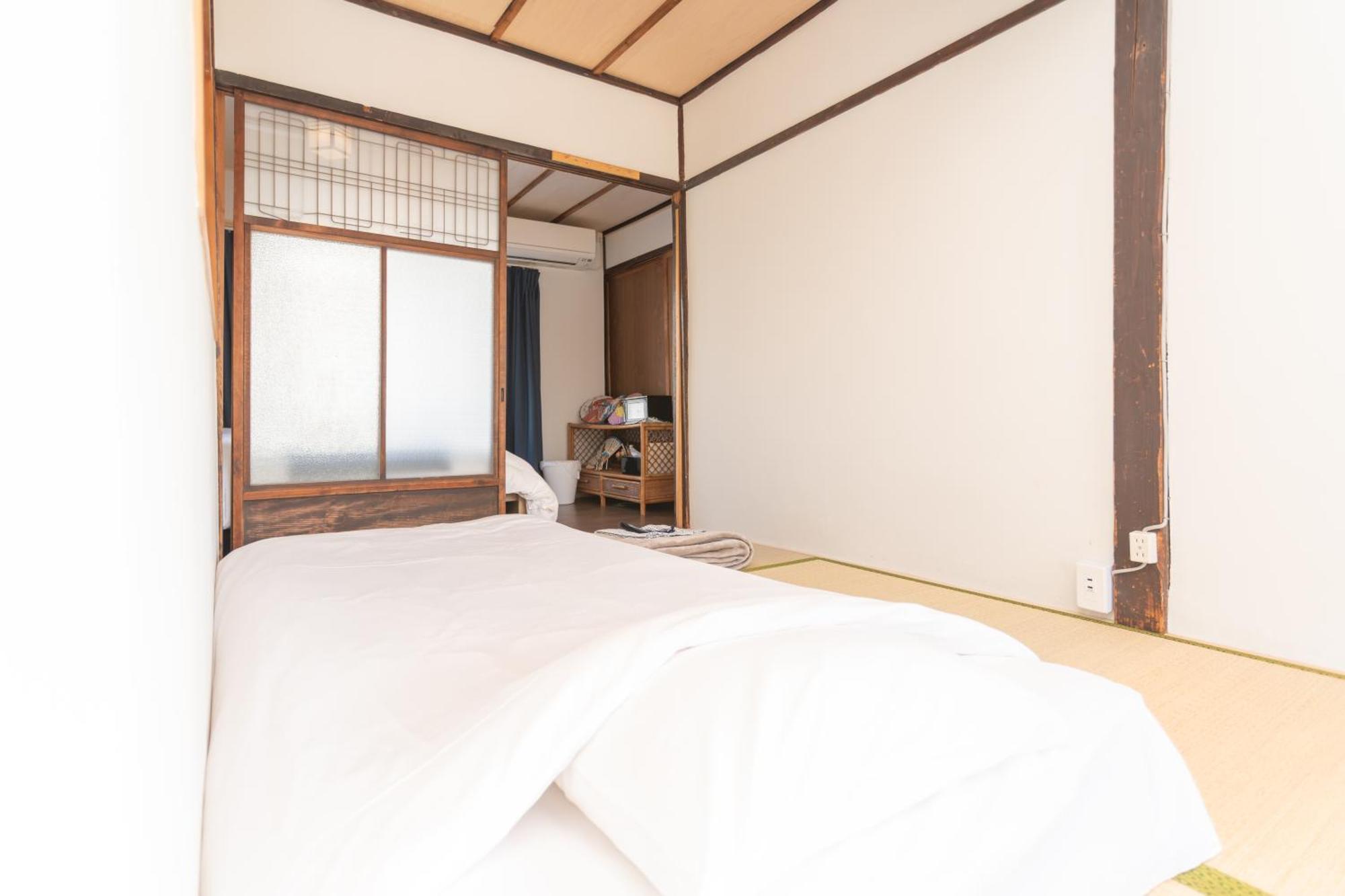 Guesthouse Oneworld Shijo四条京町屋 Kyoto Bagian luar foto